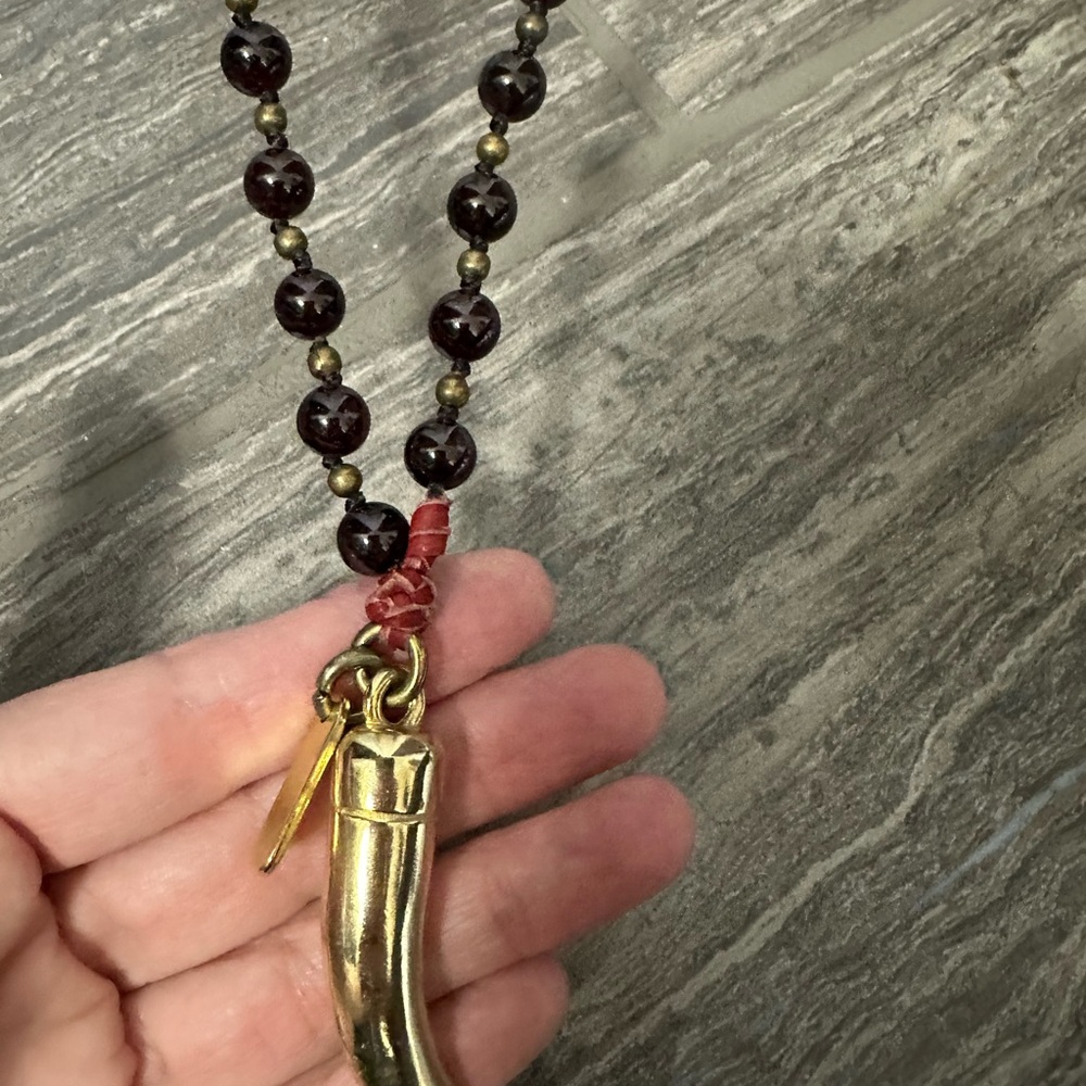 Gold Horn Pendant Necklace with Deep Red Stones. **High quality